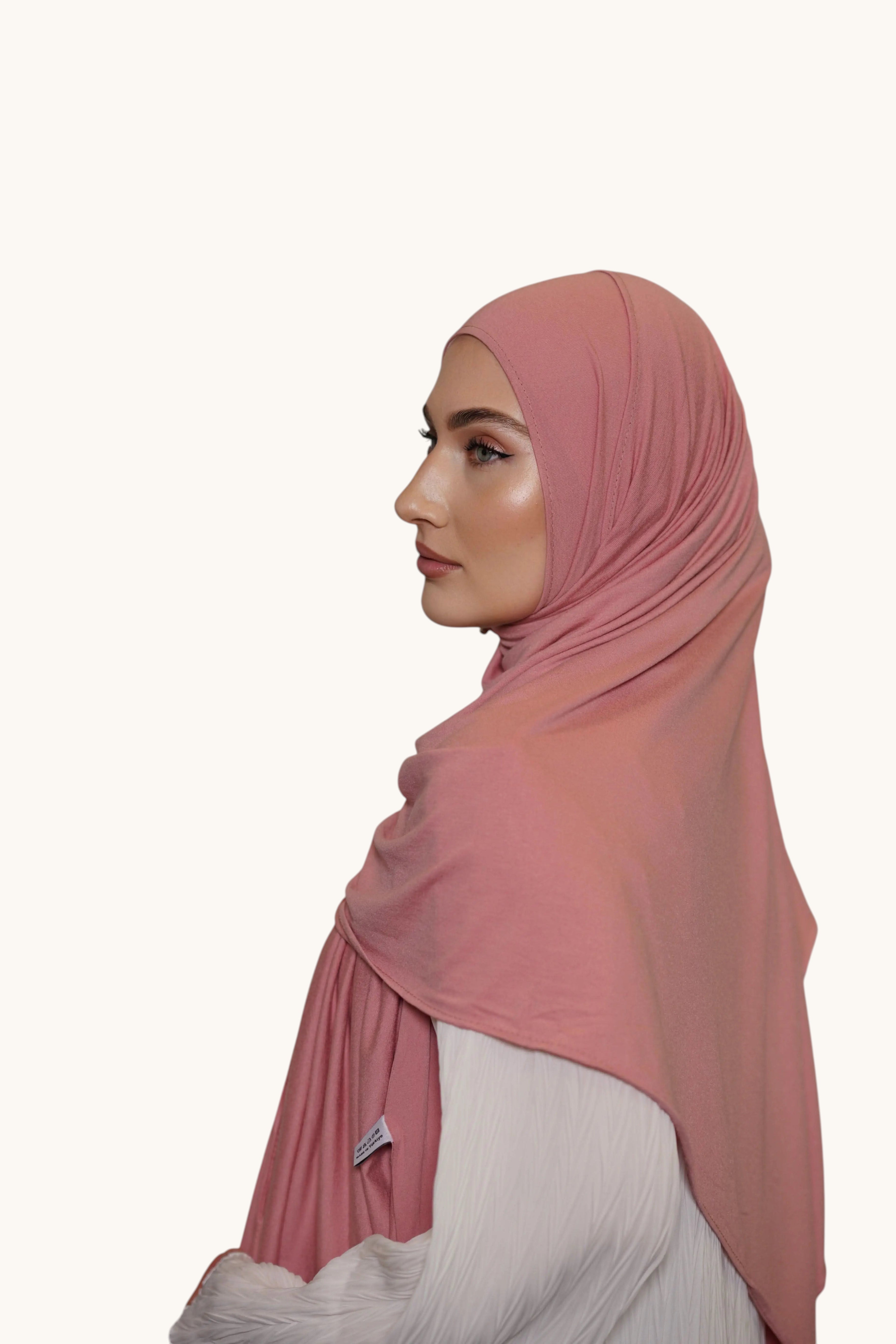 Rosa Losyana.Shop Jersey aus weicher Baumwolle, bequem und stilvoll, mit lockerer Passform und feiner Strickstruktur.