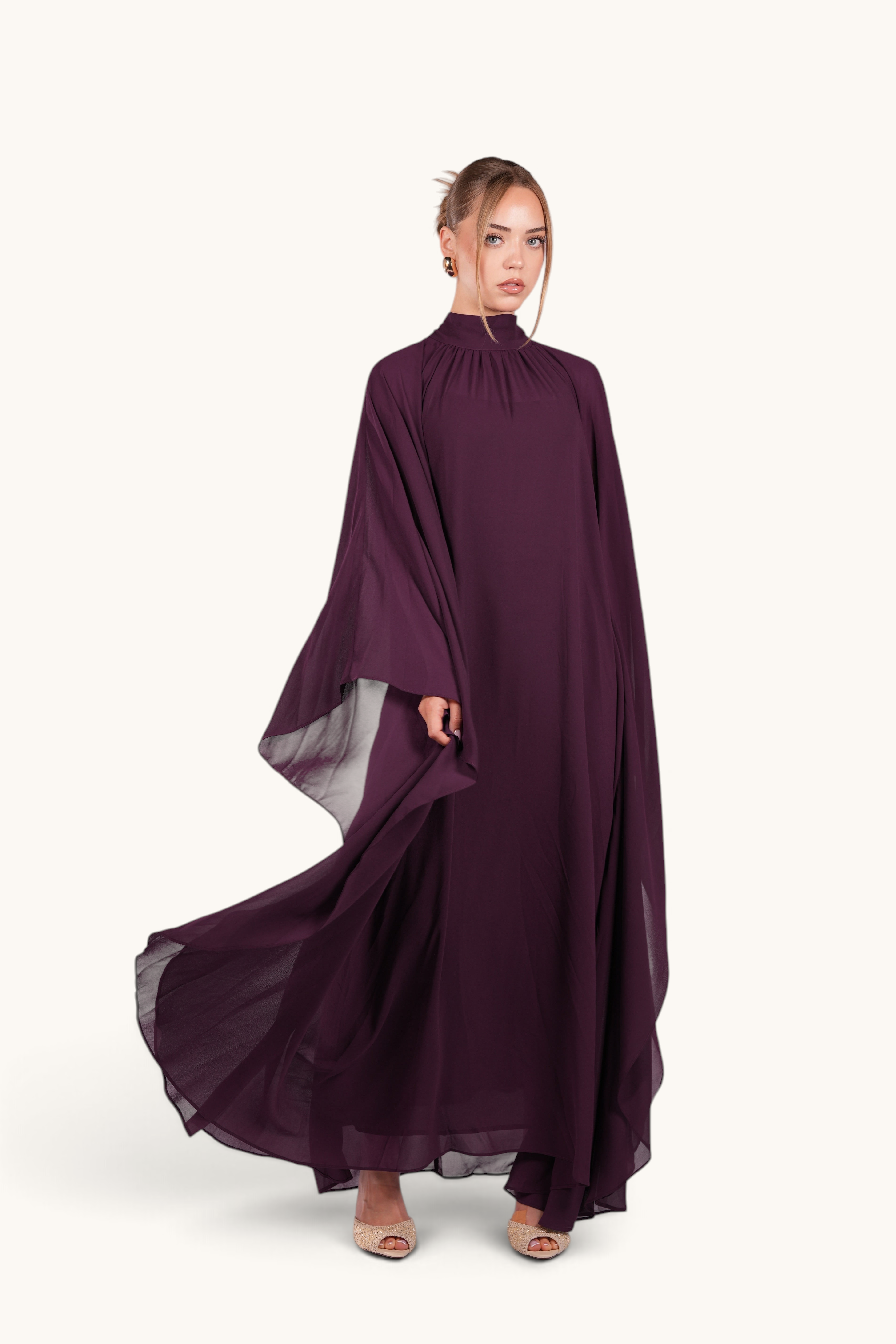 LOSYANA Andalusia mulberry chiffon cape dress with high neckline and flowing silhouette worn by a model