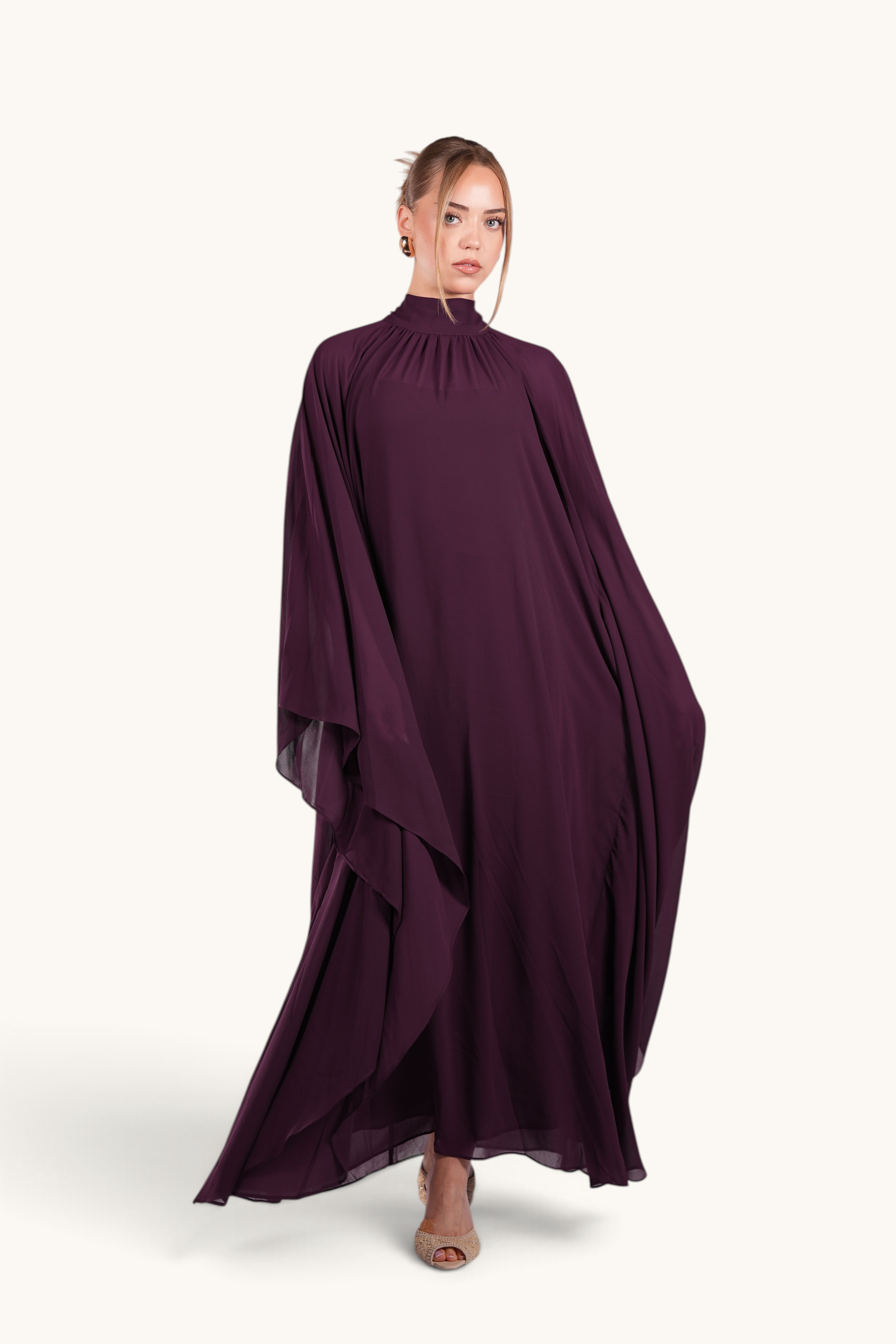 LOSYANA Andalusia mulberry chiffon cape dress with high neck and flowing silhouette worn by a model