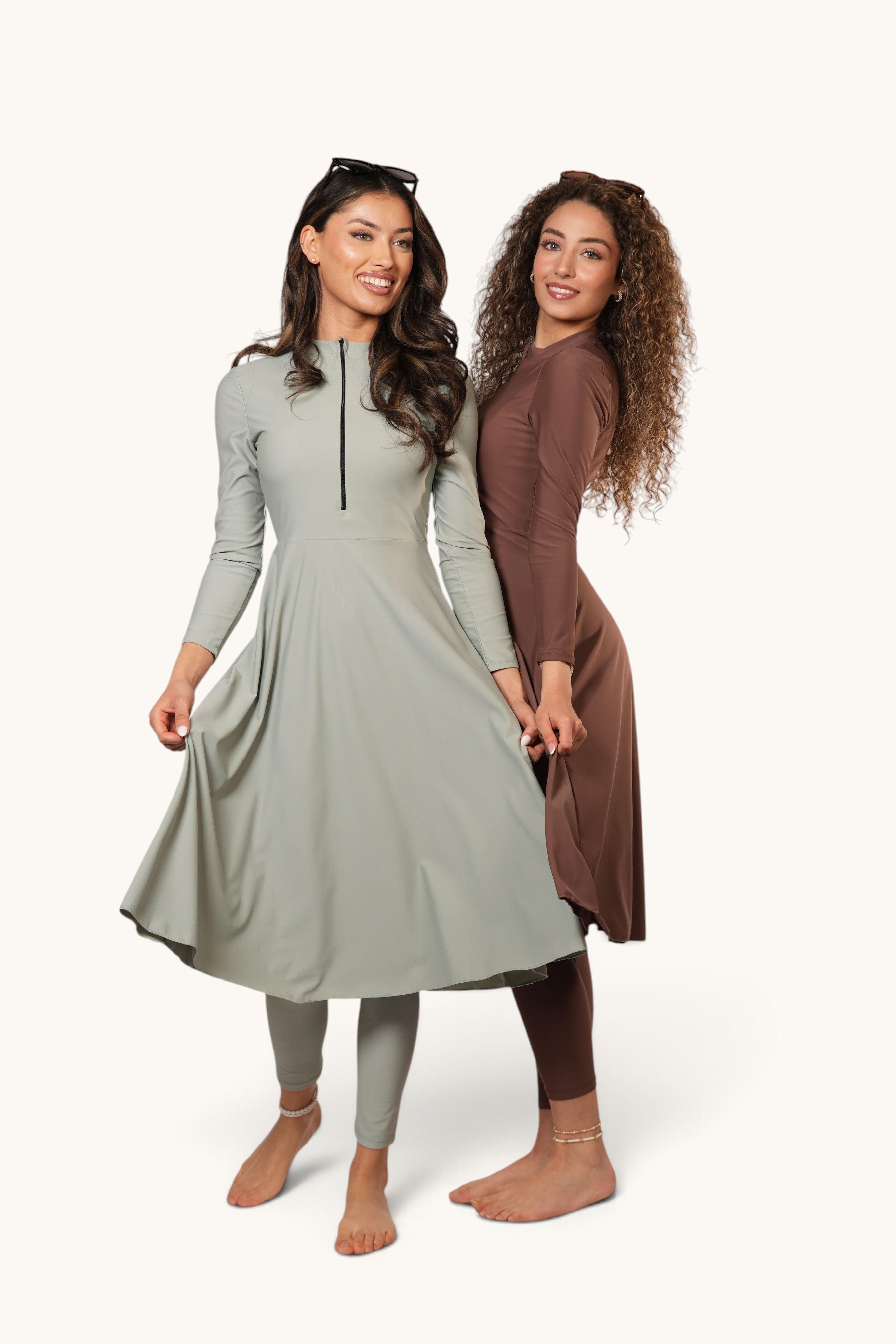 Two models wearing LOSYANA Azzurra burkini sets in mint and brown, featuring long-sleeved tops and matching leggings.