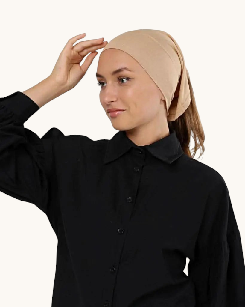 LOSYANA beige open underscarf worn by a woman under a hijab for comfortable hair coverage