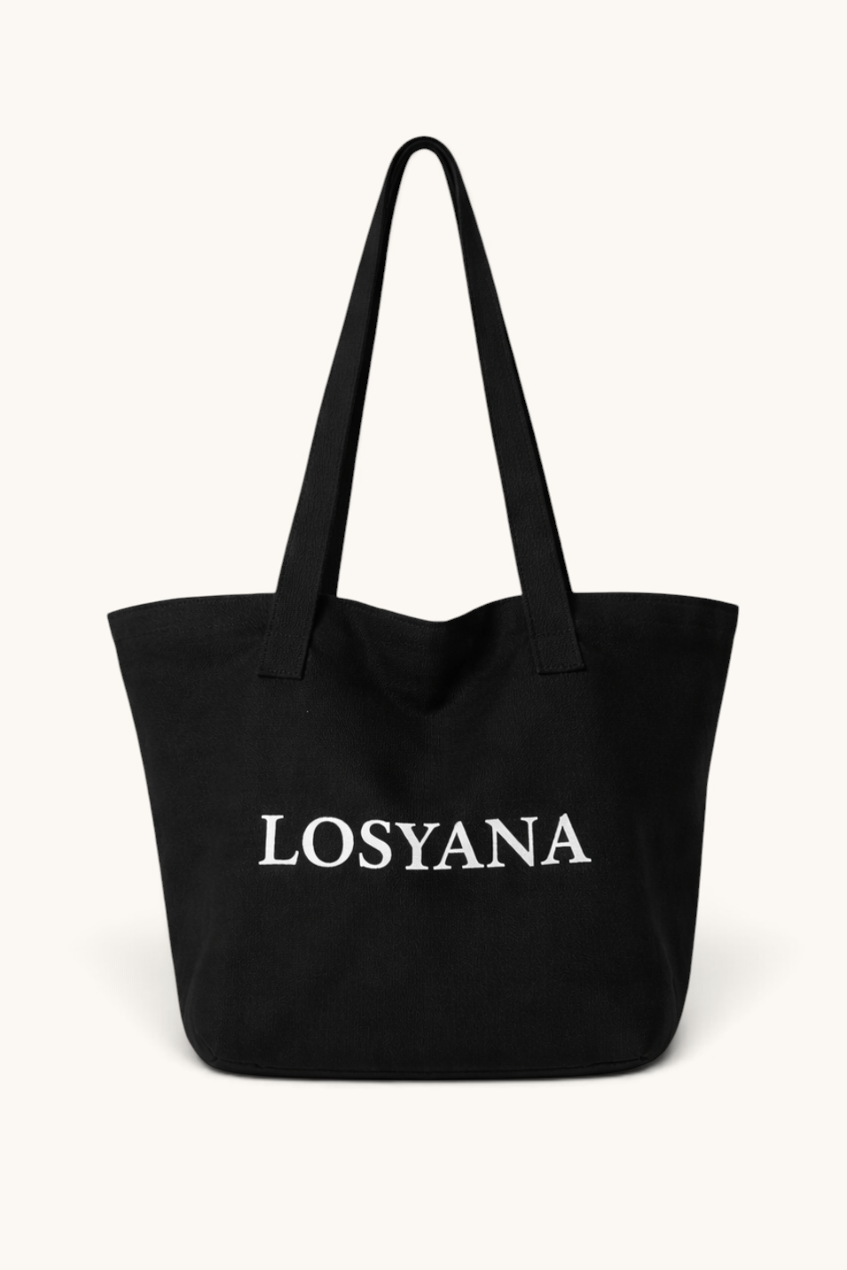 LOSYANA black cotton canvas tote bag with minimalist white logo branding and sturdy shoulder straps