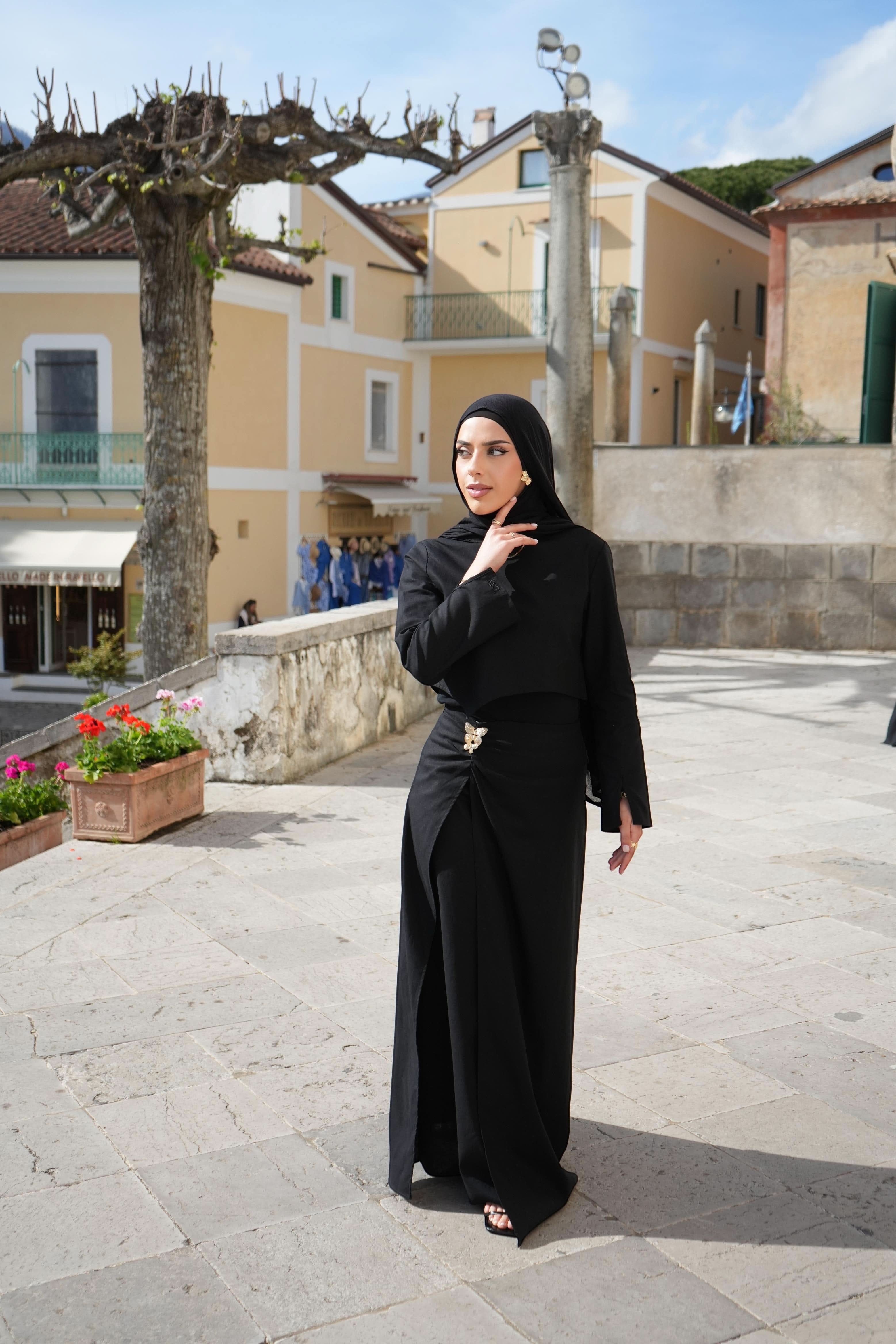 LOSYANA black Mediterrance Serenity Set in breathable linen-cotton blend worn by a model in a Mediterranean town square