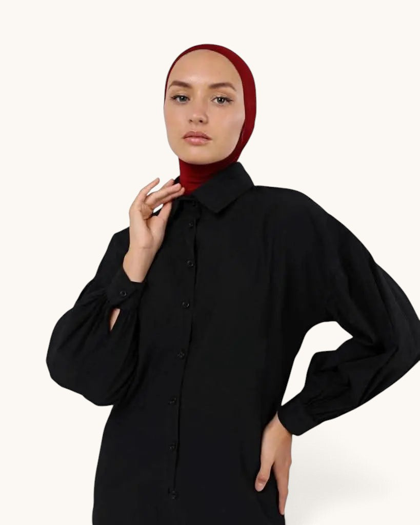 LOSYANA bone underscarf in deep red worn by a model under a black button-down shirt for comfortable hijab styling.