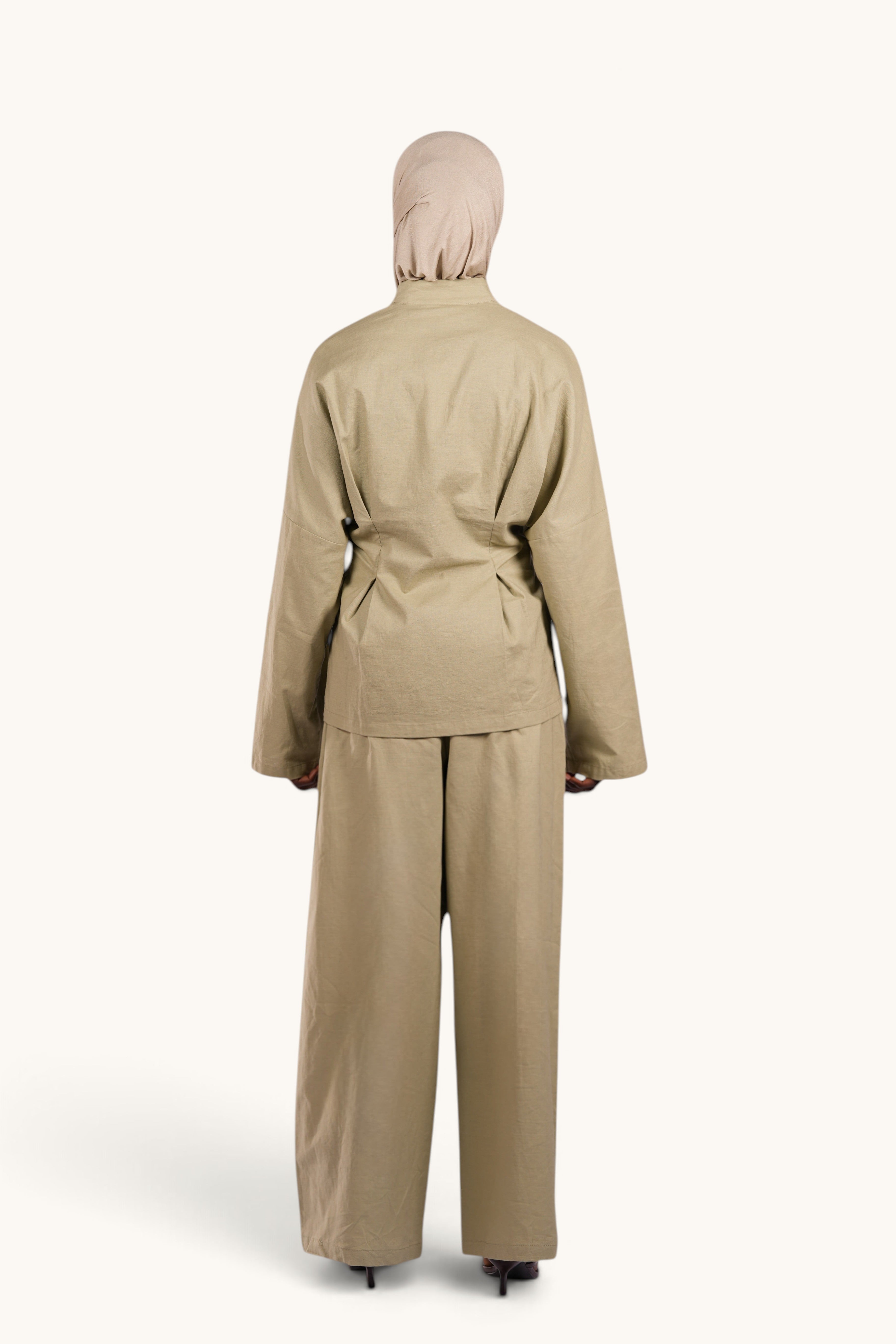 LOSYANA Gran Canaria pistachio linen two-piece set with wide-leg trousers and long-sleeved top, back view
