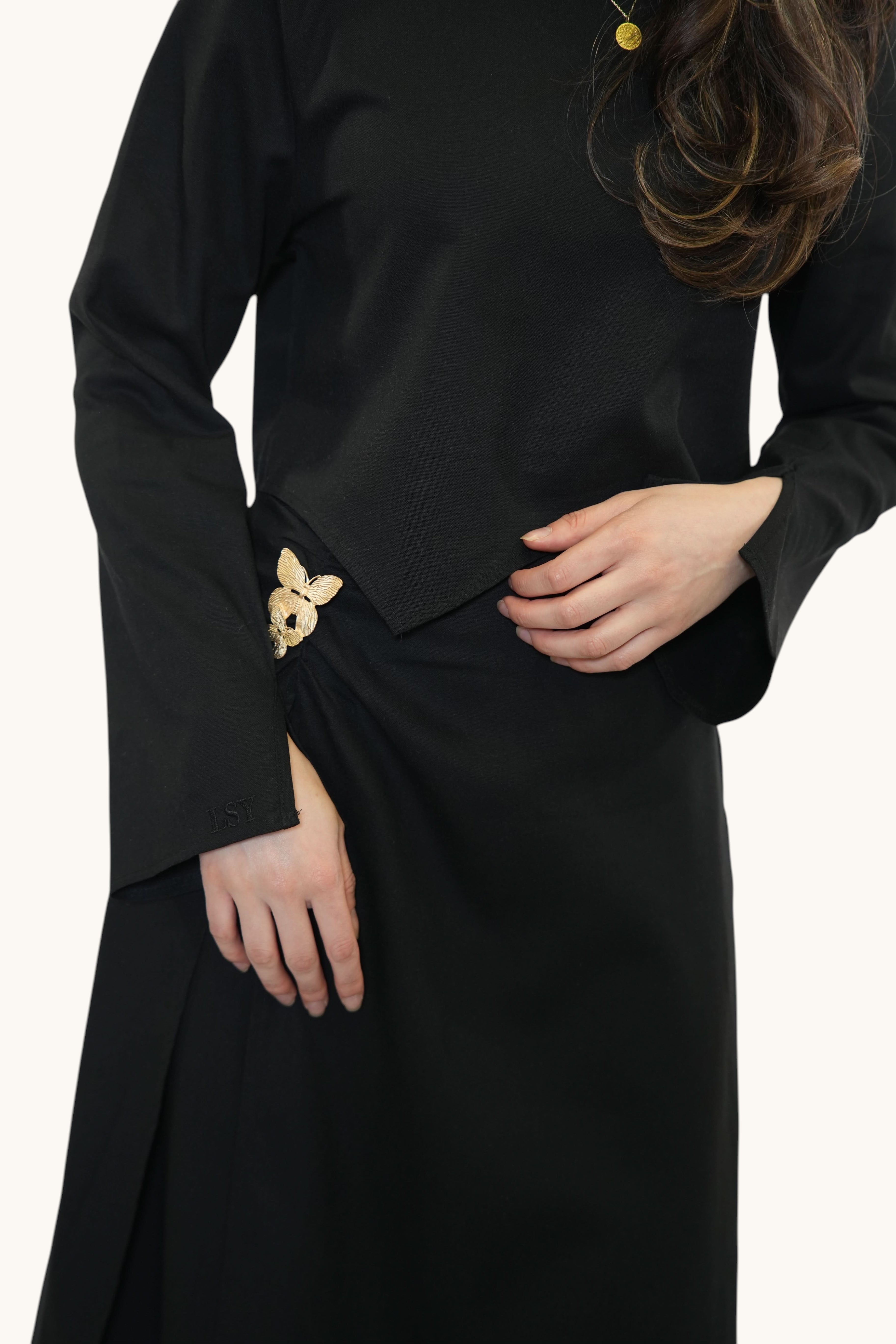 LOSYANA Mediterrance Serenity Set in black featuring a breathable linen-cotton blend with a gold butterfly brooch.