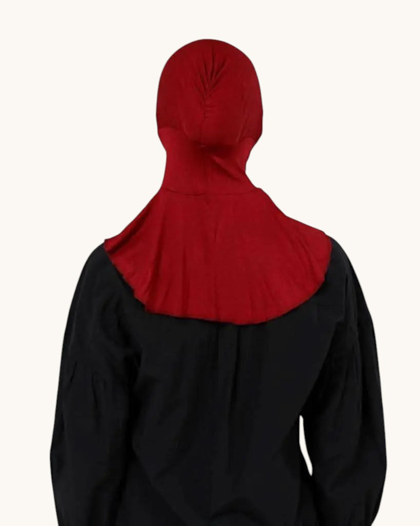 LOSYANA red underscarf worn under a hijab, providing comfortable hair coverage and a secure fit from the back view.
