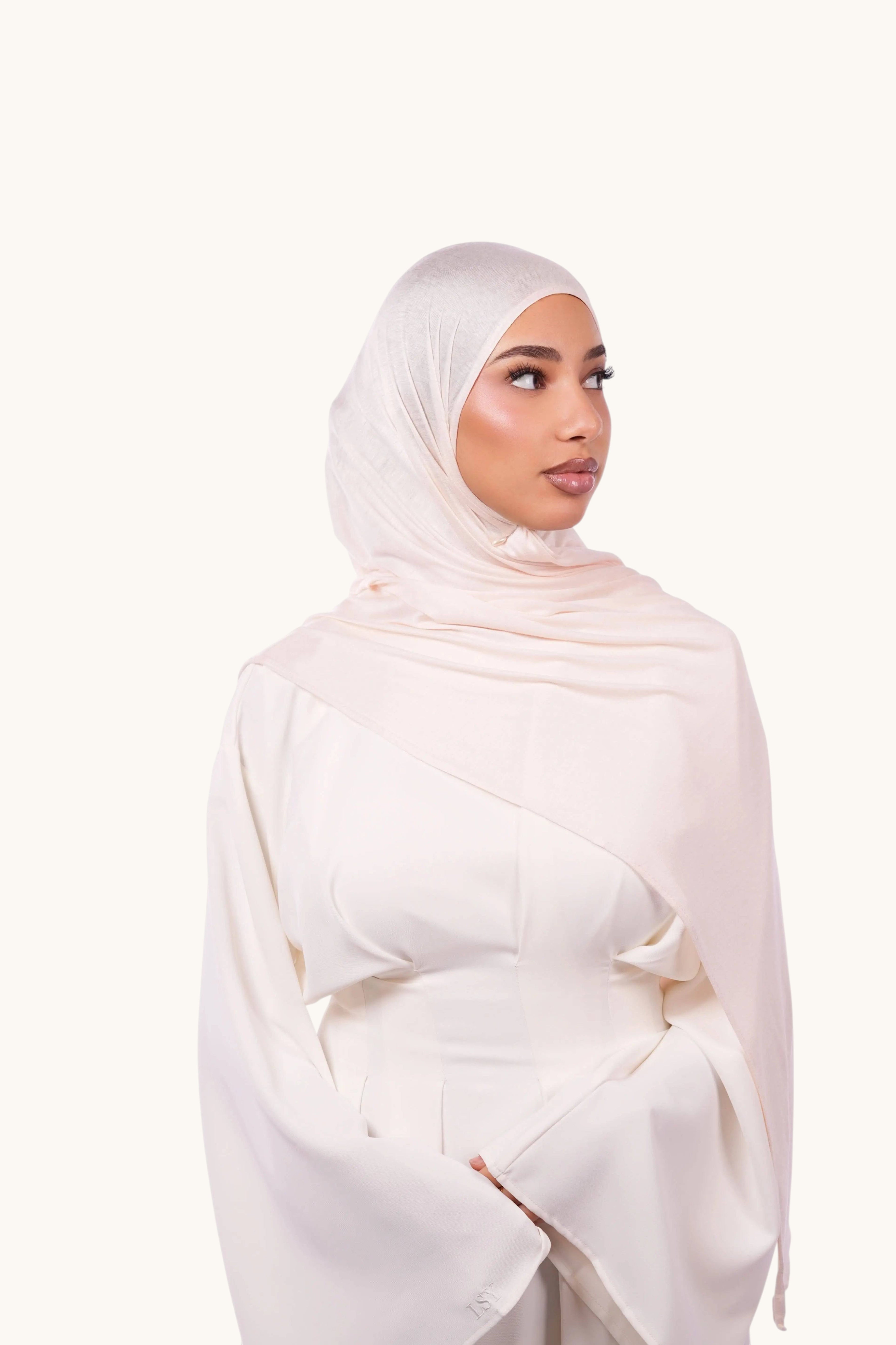 Weiches Bambus-Jersey in apricot-weiß, hochwertiges Stoffmaterial, perfekt für bequeme Kleidung von Losyana.Shop.