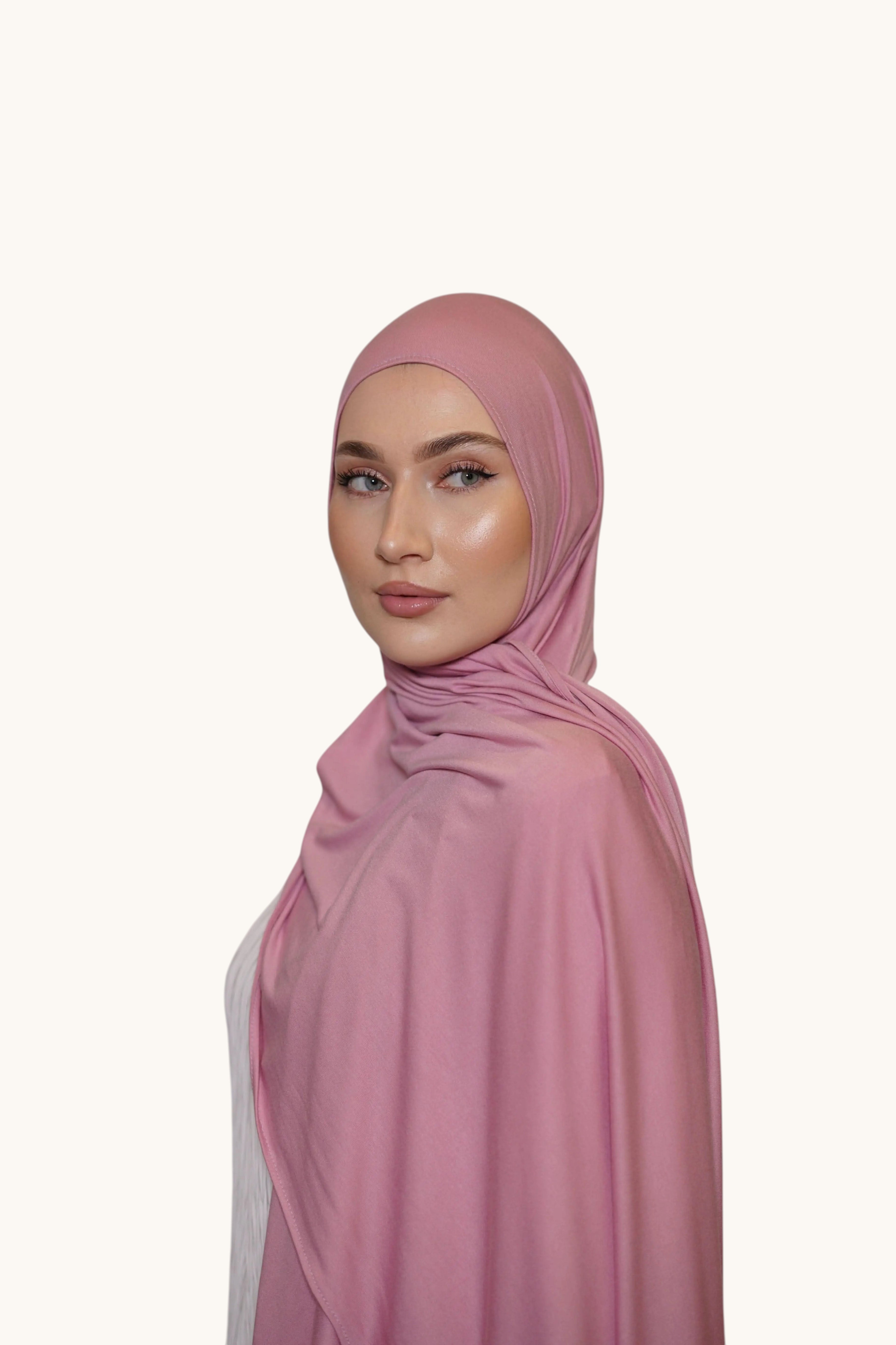Weißes Losyana.Shop Barbie-Jersey mit rosa und blauen Mustern, bequem und stilvoll für Barbie-Fans.