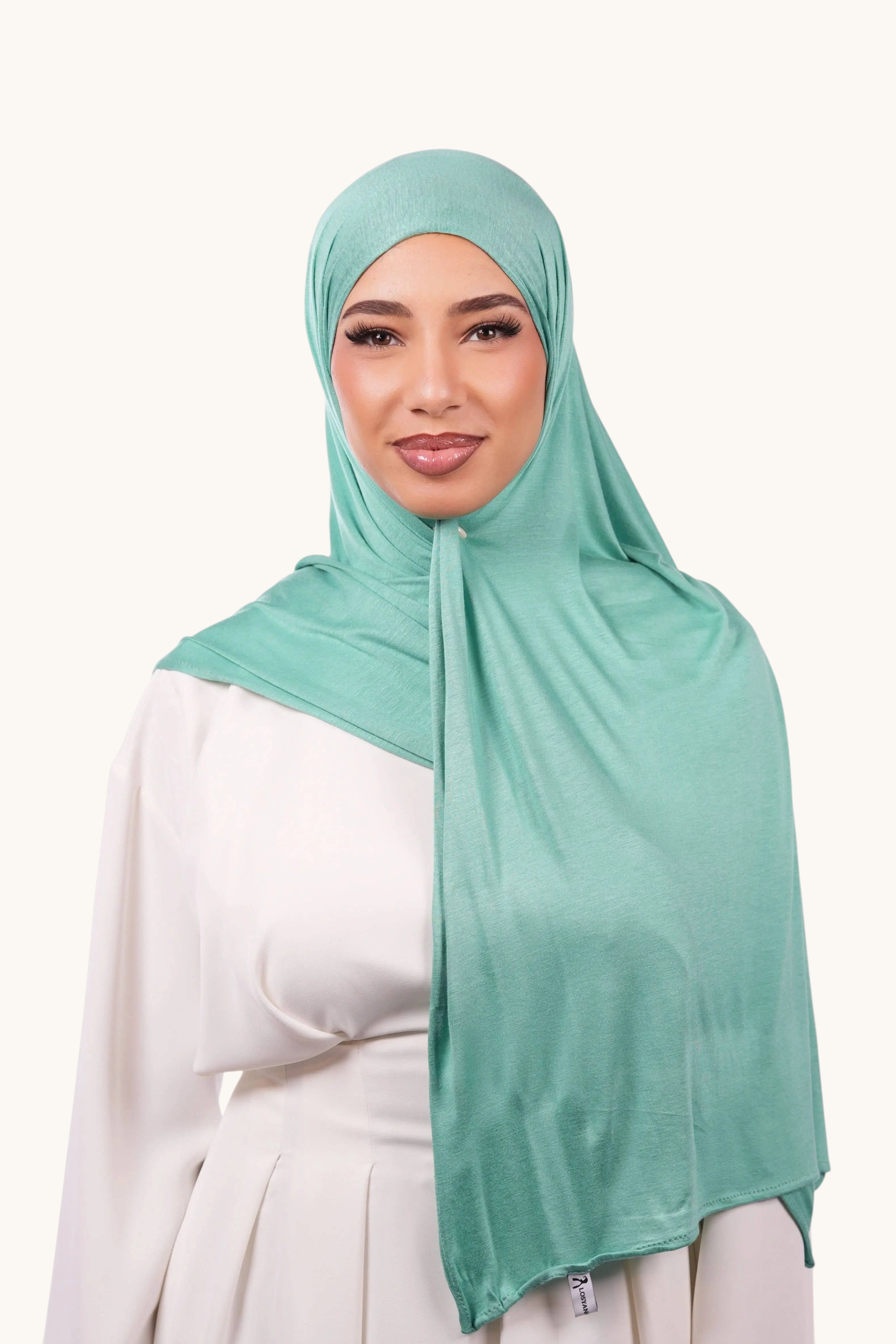 Bambus-Jersey in Pfefferminzfarbe von Losyana.Shop, weiches Stoffmuster, fließende Textur, ideal für bequeme Kleidung.