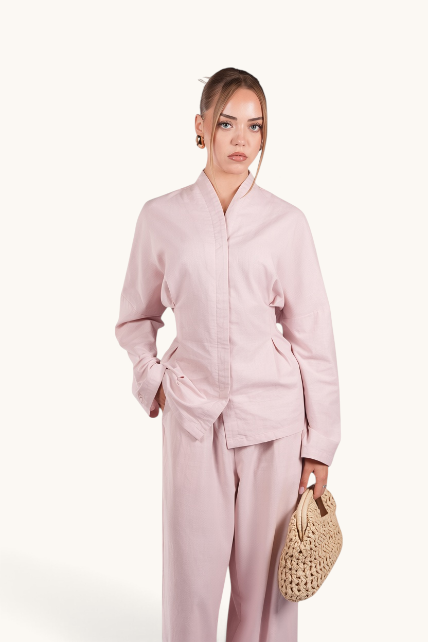 LOSYANA Gran Canaria almond linen two-piece set with trumpet sleeves and wide-leg trousers on a model