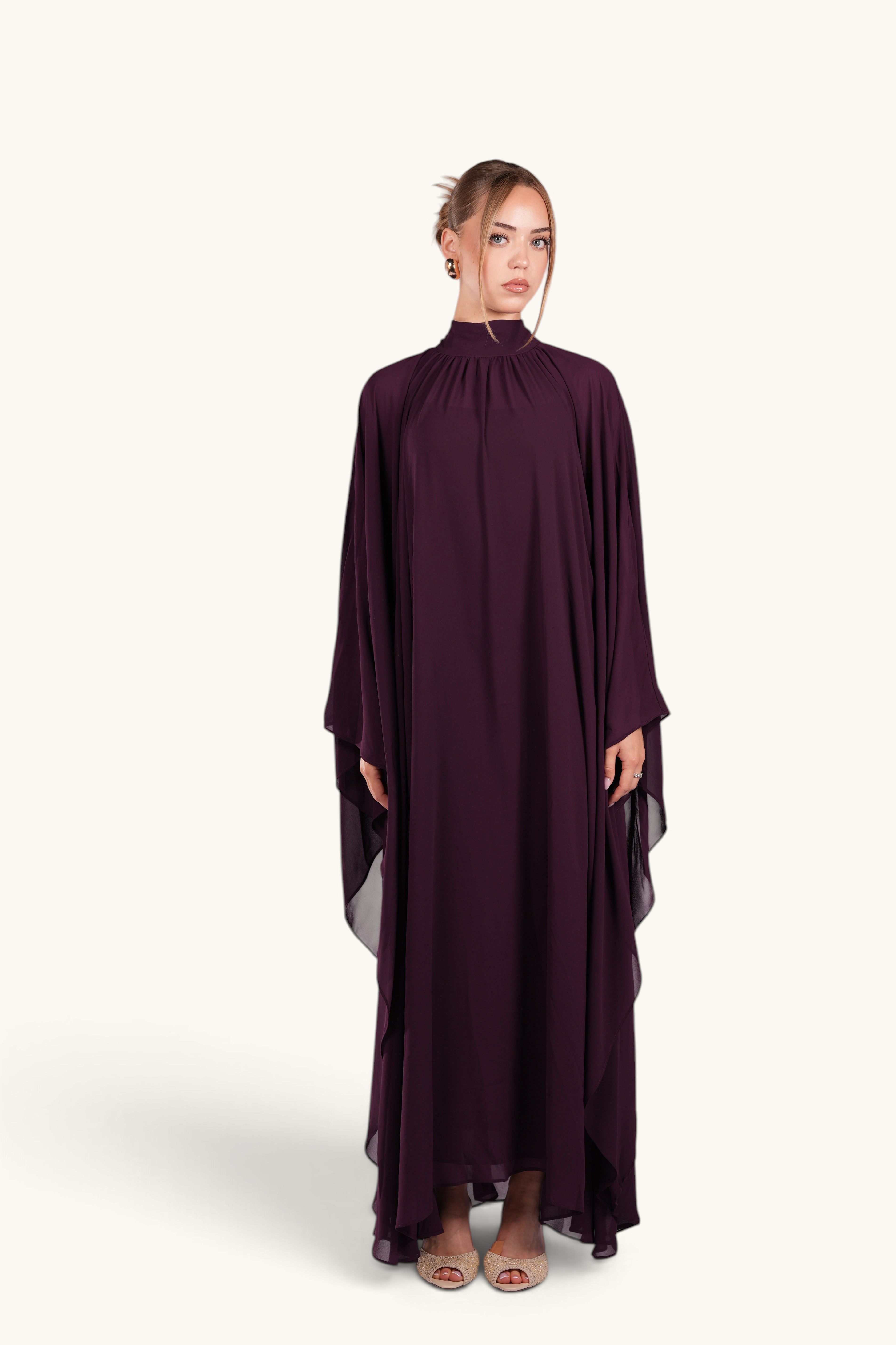 LOSYANA Andalusia mulberry chiffon cape dress with a high neckline and flowing silhouette worn by a model