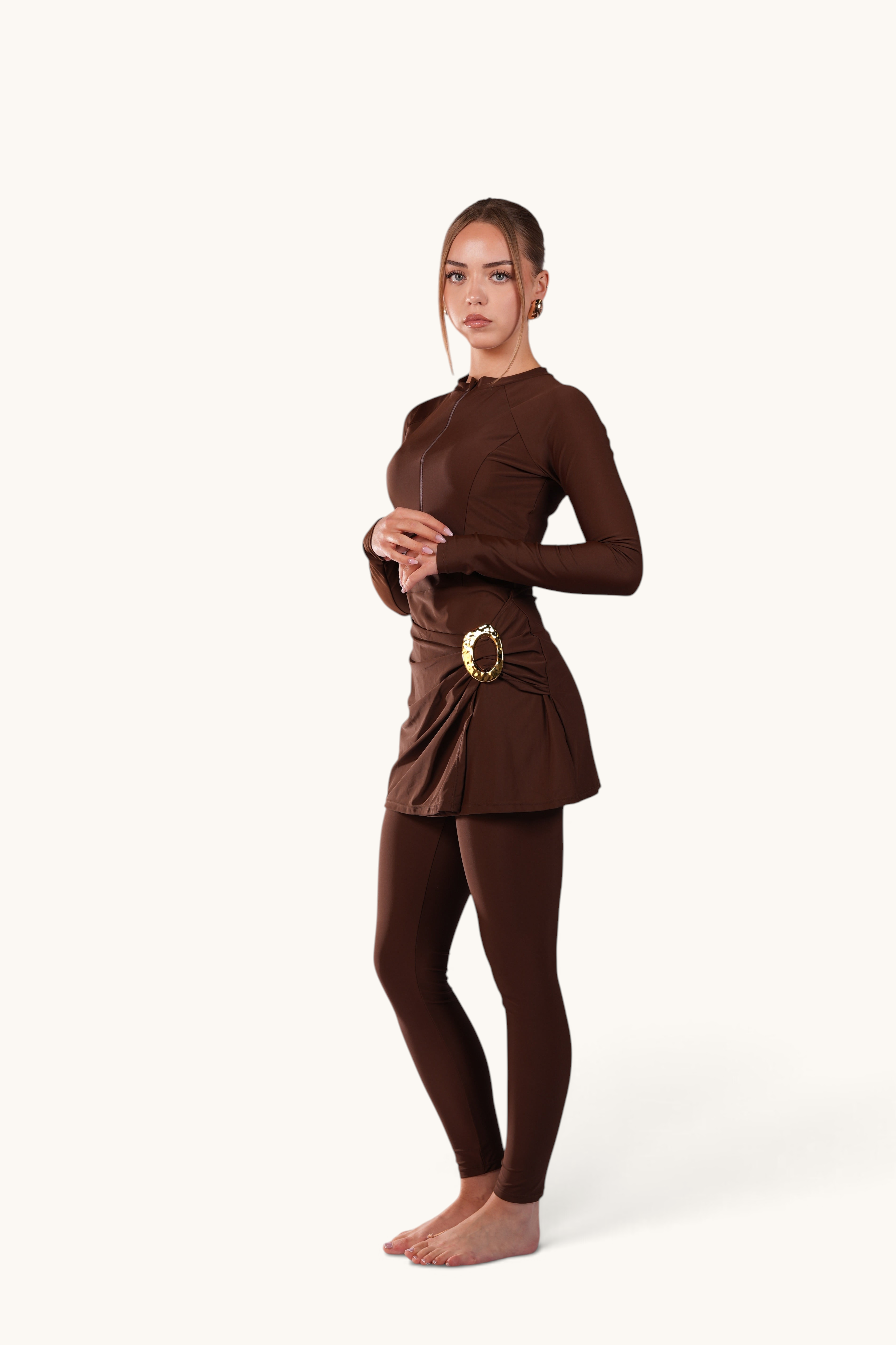 LOSYANA Costa Blanca espresso brown burkini with long sleeves, front zipper, and elegant gold hip detail on model