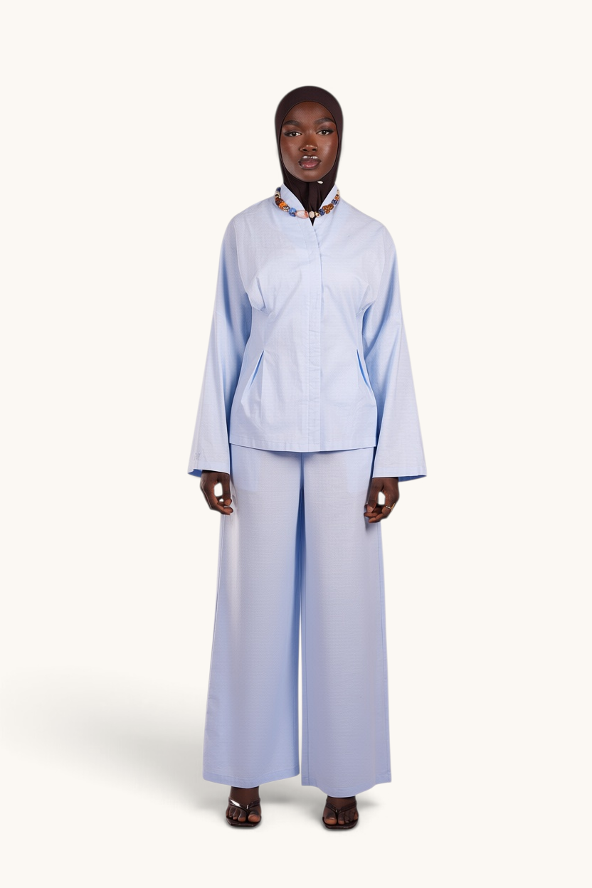LOSYANA Gran Canaria aqua linen two-piece set featuring wide-leg trousers and a top with trumpet sleeves