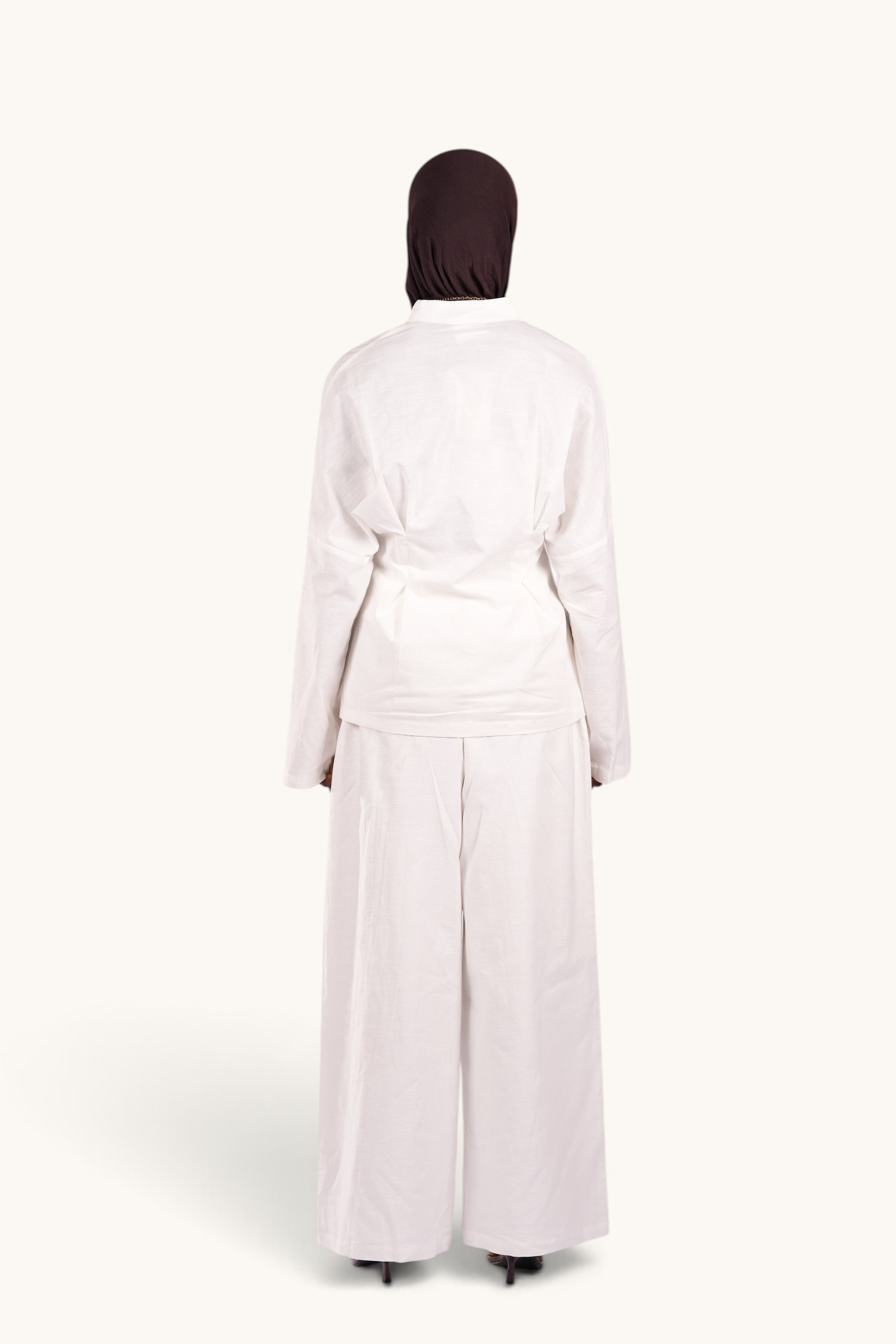 LOSYANA Gran Canaria white linen two-piece set with wide-leg trousers and long-sleeve top, back view