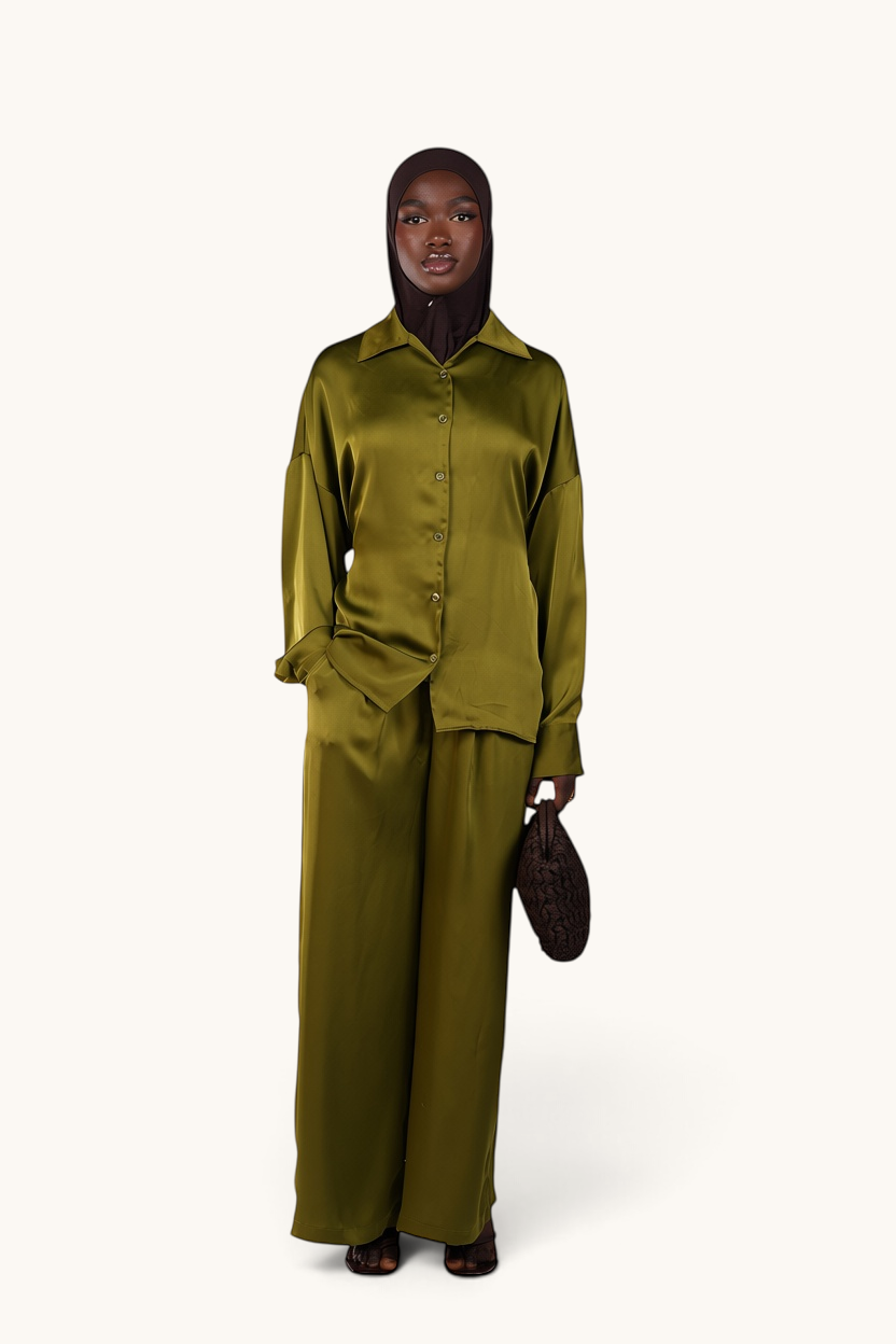LOSYANA La Laguna lime green satin two-piece set with button-down blouse and wide-leg trousers worn by a model.