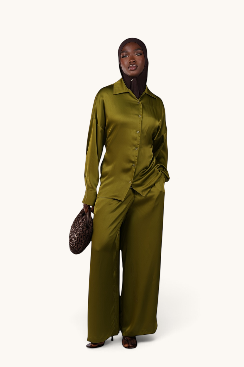 LOSYANA La Laguna lime green satin two-piece set featuring a button-down blouse and wide-leg trousers on a model.