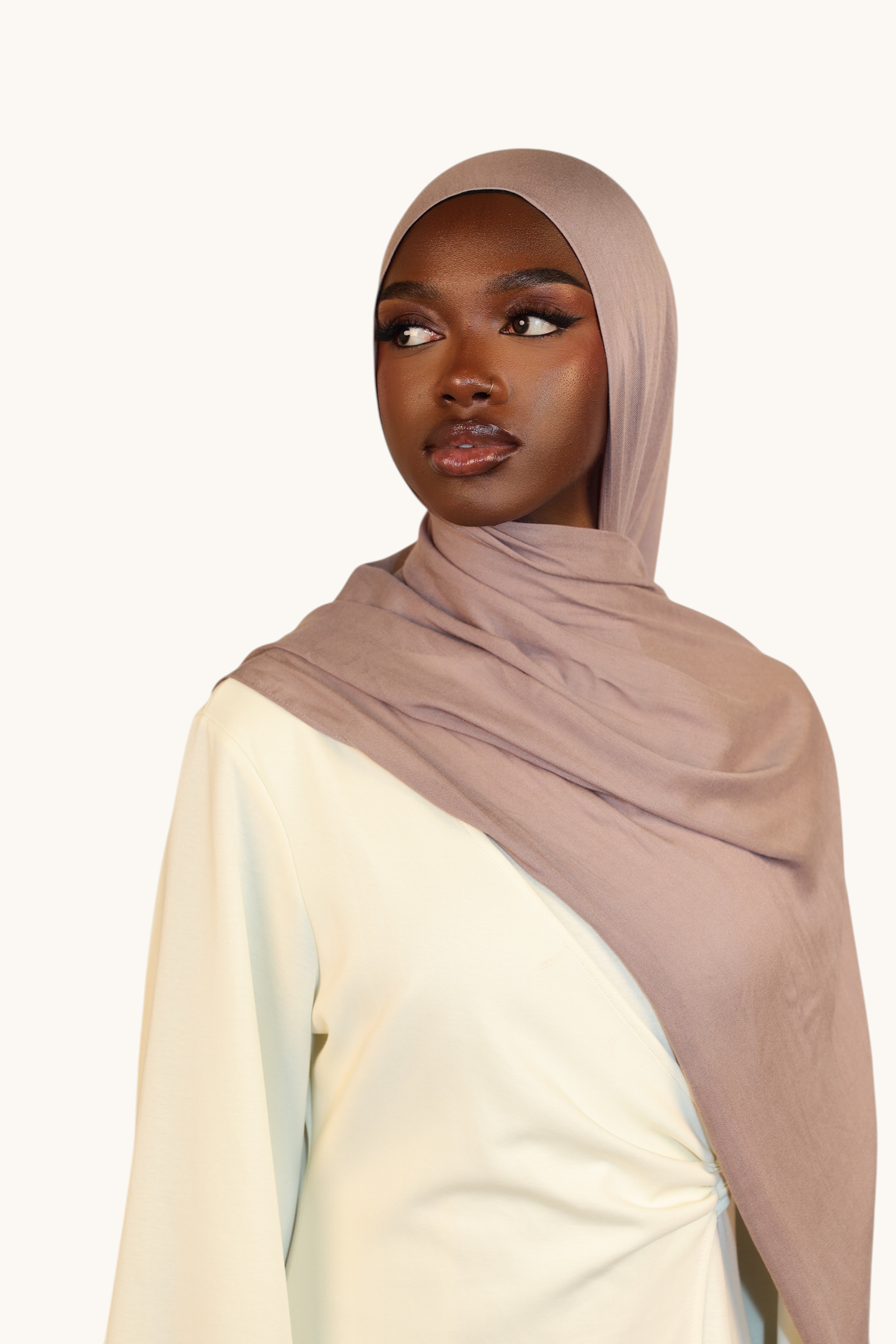 LOSYANA taupe gray lightweight modal hijab worn by a model with a matching undercap for an elegant flowing look