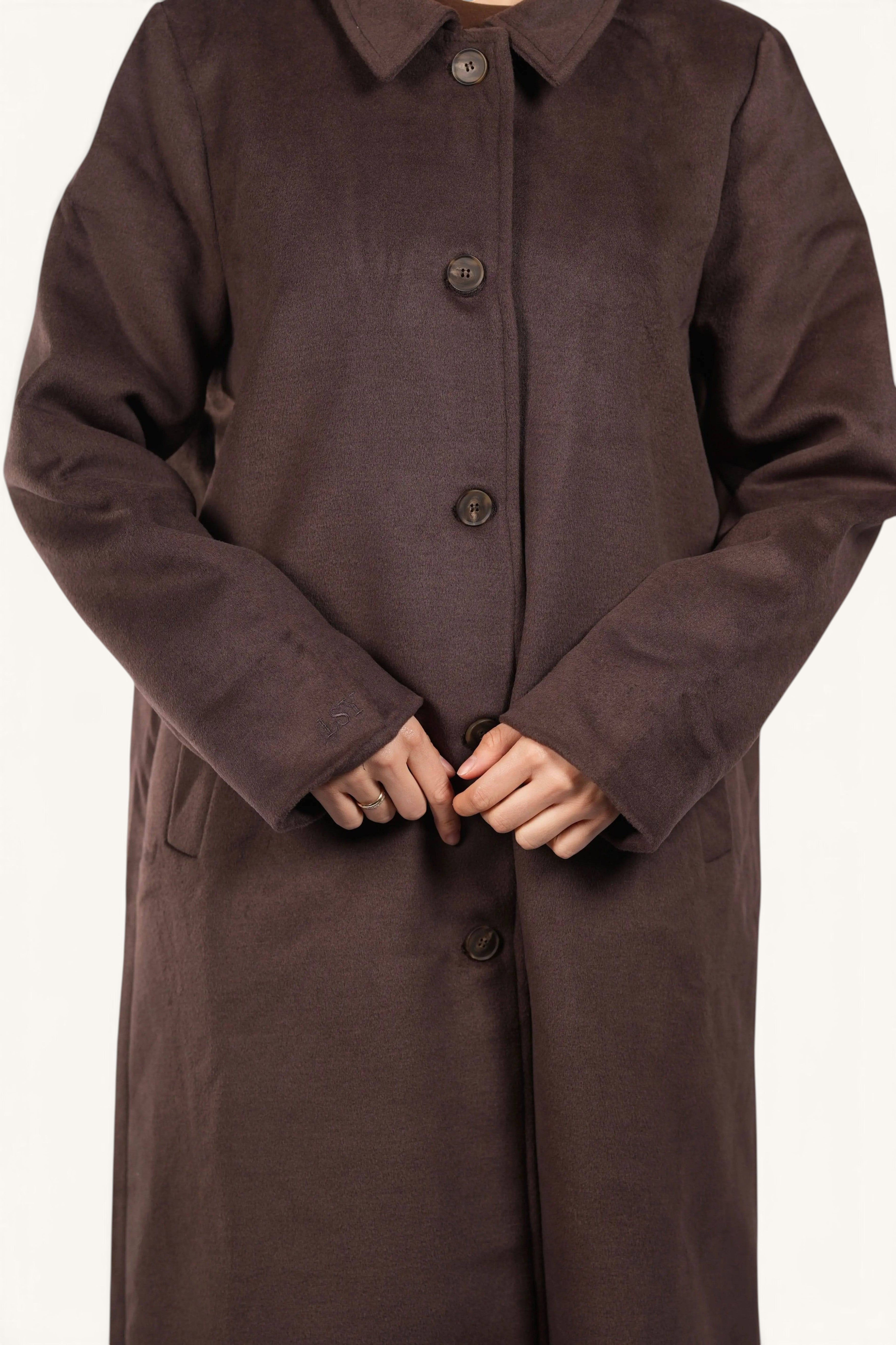 LOSYANA The Vienna Coat in espresso brown with a classic collar, button-front closure, and long sleeves.